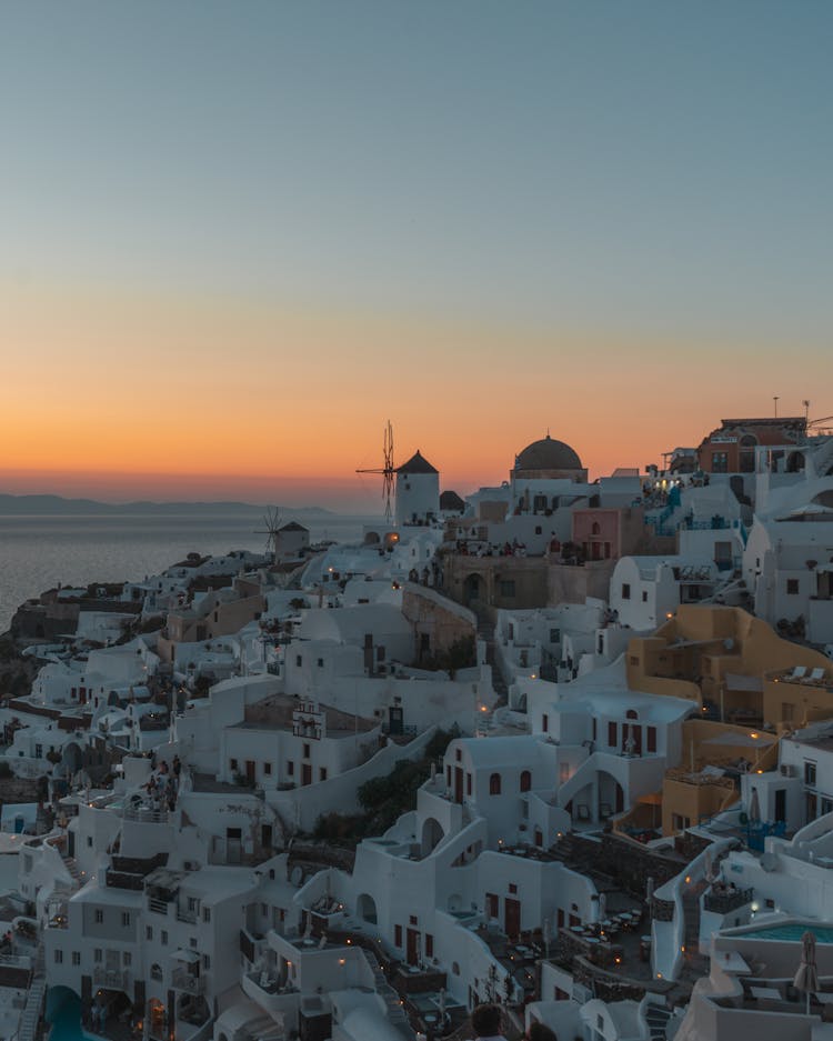 The View From Above Of Santorini At Sunset