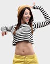 A Woman in Black and White Striped Long Sleeve Crop Top