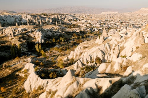 Free Rocky formations with plants in desert Stock Photo