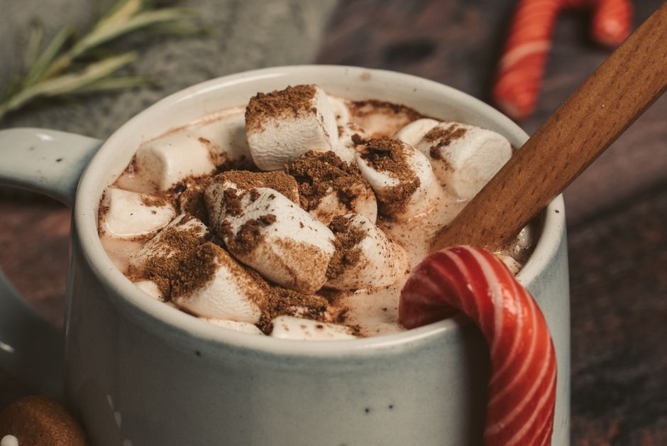 Indulge in a cozy cup of hot chocolate with marshmallows and cinnamon, perfect for winter warmth.