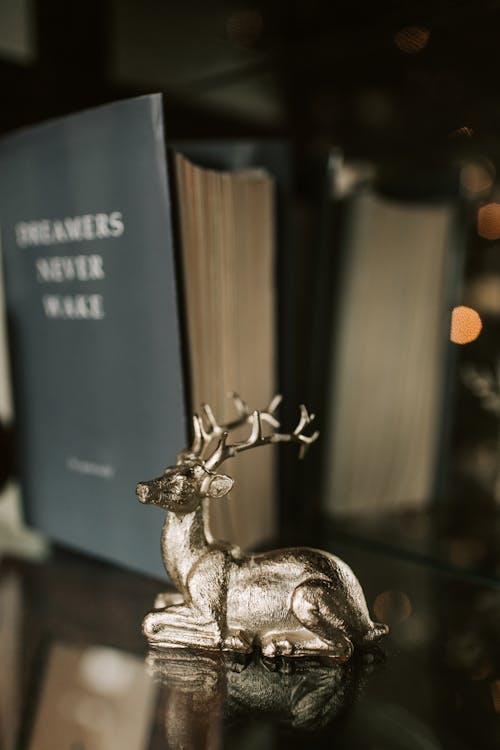 Silver Deer Figurine on the Table