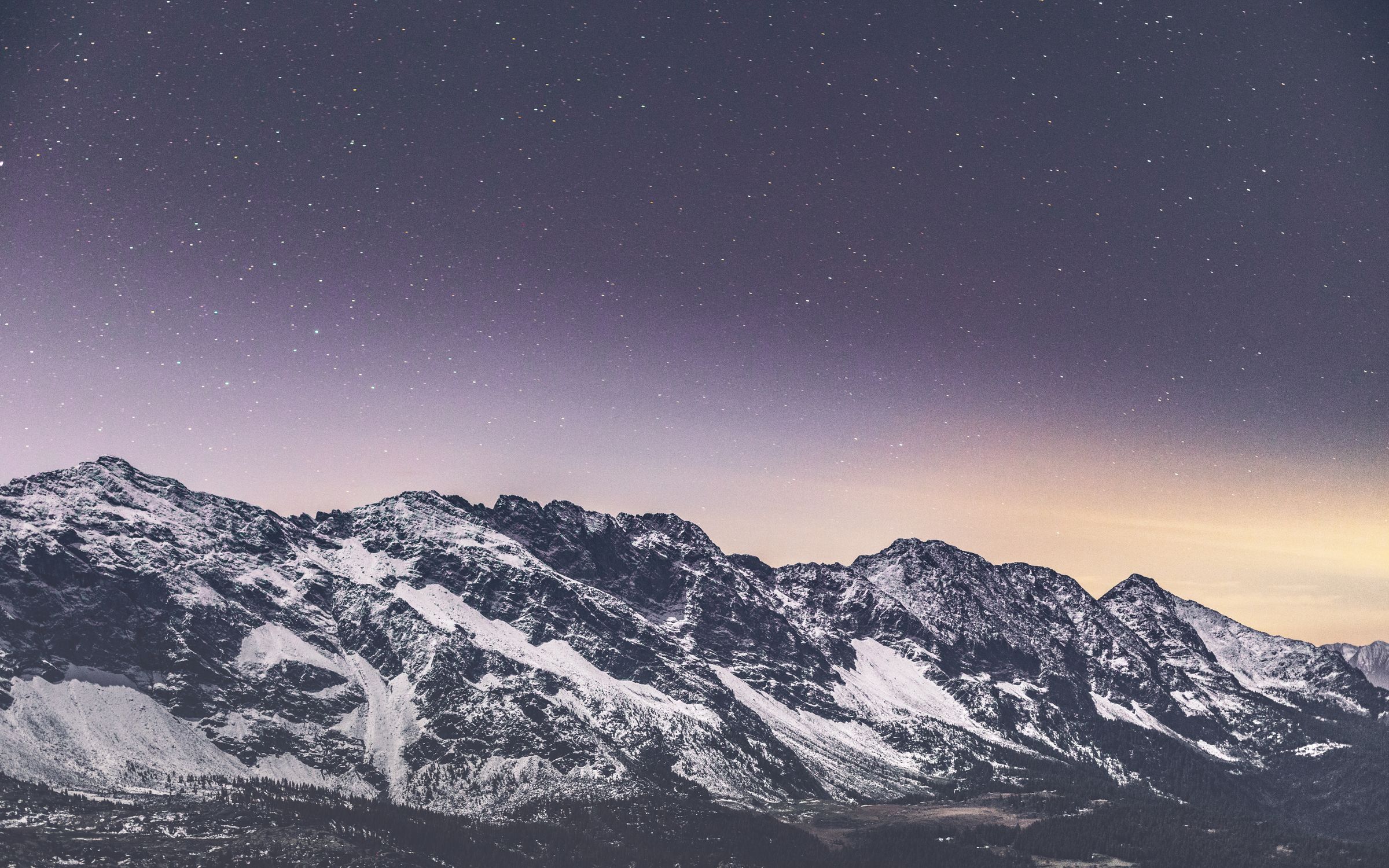 Snow Covered Mountain Under the Starry Night Sky · Free Stock Photo