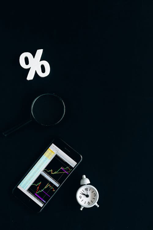 Free Black Smartphone on Black Table Stock Photo
