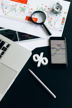 An organized workspace featuring charts, gadgets, and financial data for modern analysis.
