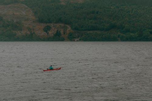 Free A Person Kayaking on the Sea Stock Photo