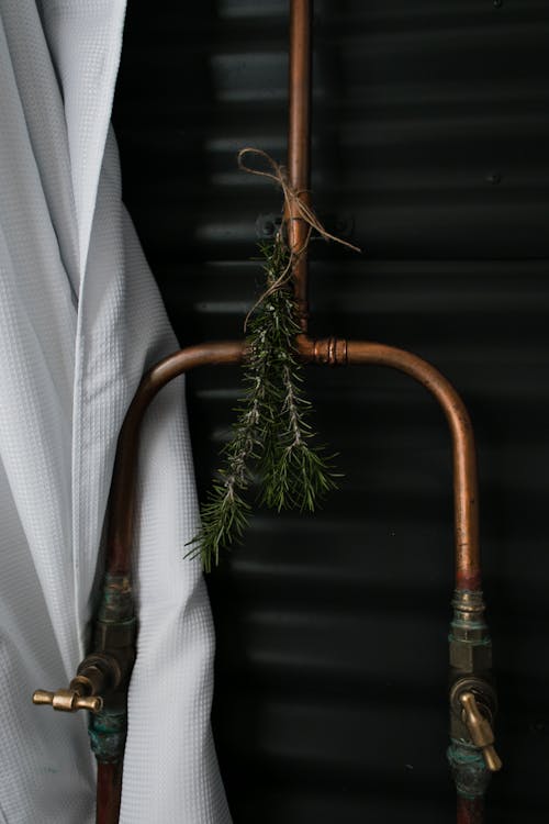 Bronze Pipes with Conifer Branch Decoration