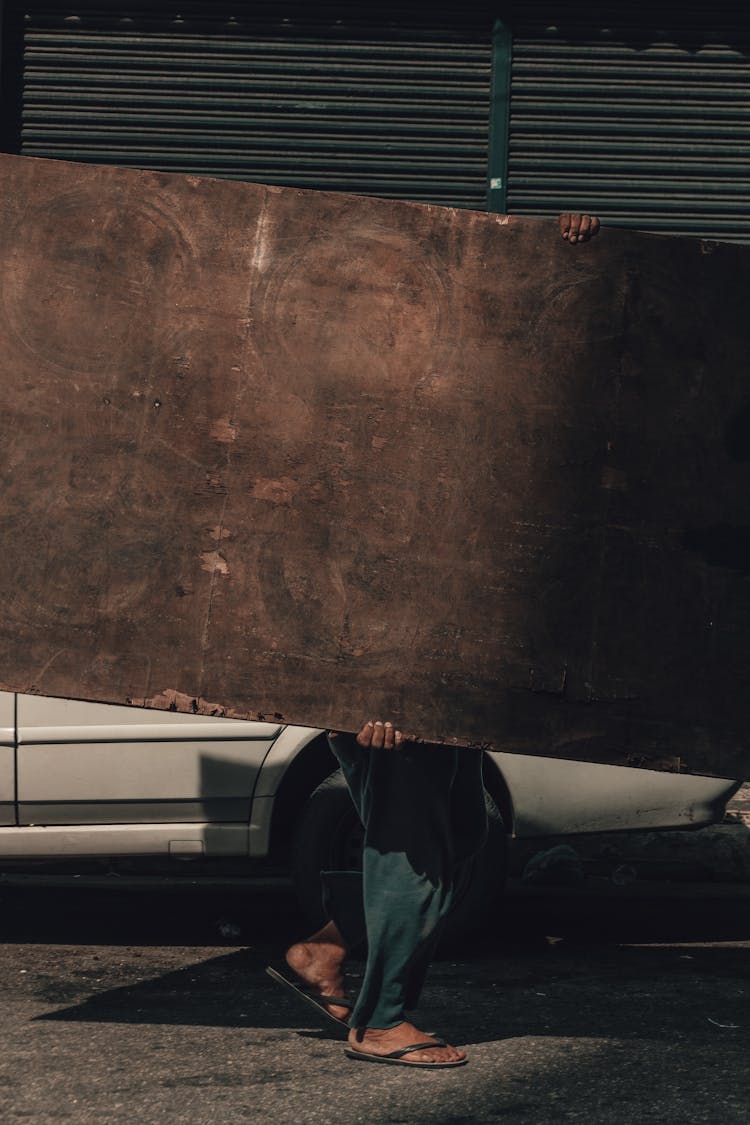 Man With Big Board On Street