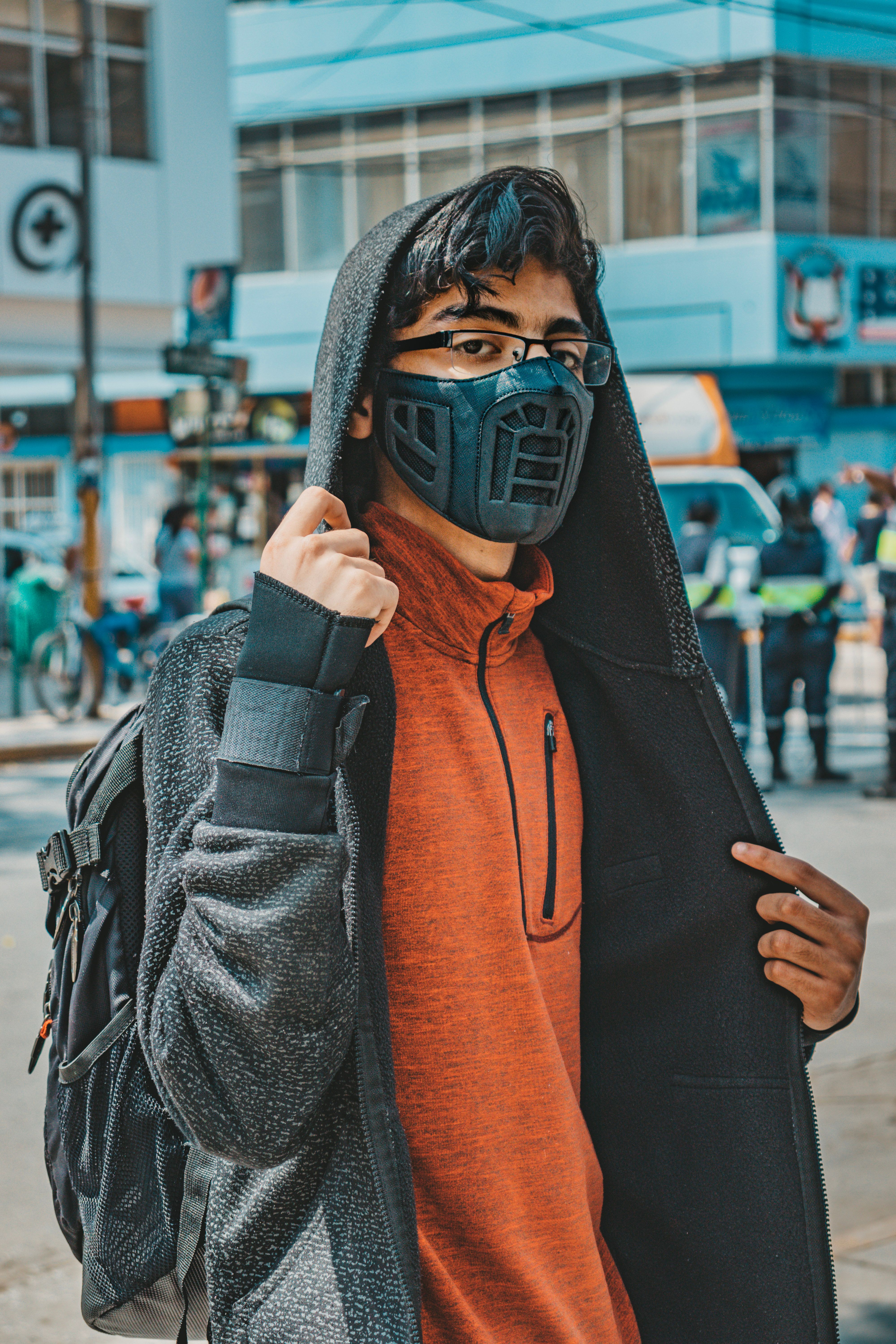 Person in Black Hoodie Wearing Black Face Mask · Free Stock Photo