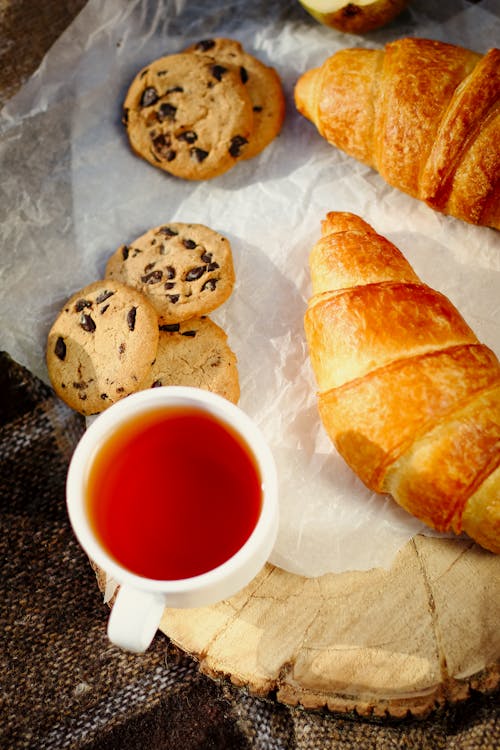 Free Croissants, Chocolate Chip Cookies and Tea Stock Photo