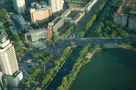 Aerial View of Asphalt Road near Buildings