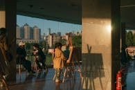 Small Girl Looking at Painting Indoors