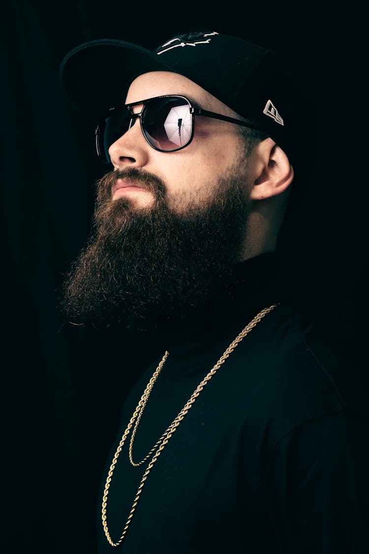 Stylish Rapper In Black Cap And Sunglasses