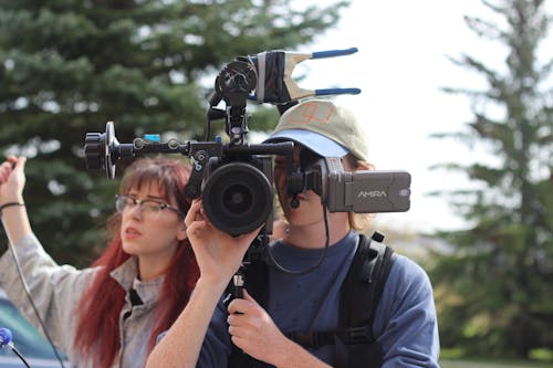 A Person Behind a Video Camera