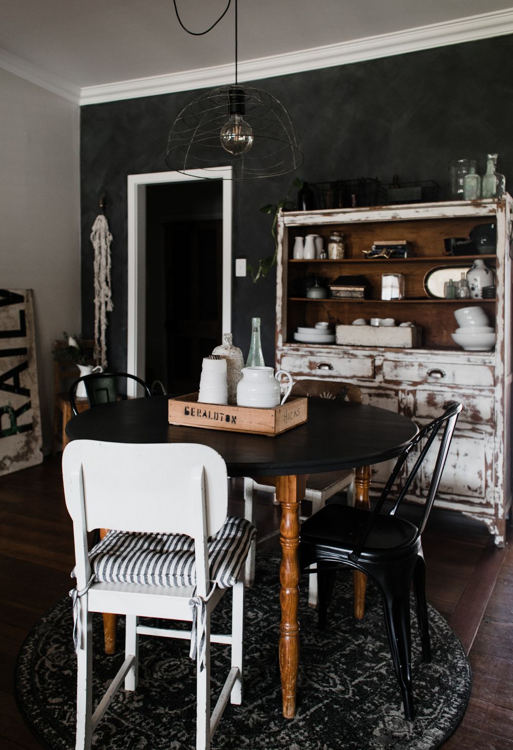 Farmhouse dining room with a laid table — photo by Rachel Claire on Pexels
