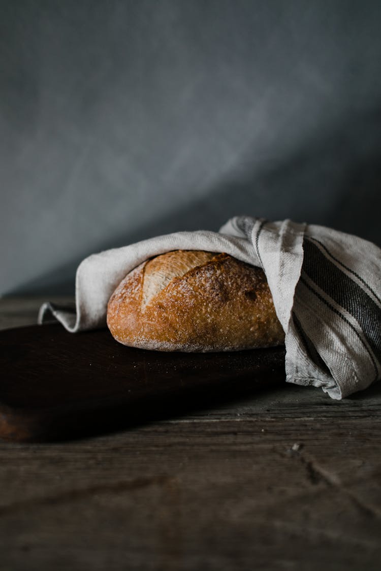 A Bread Covered In Cloth