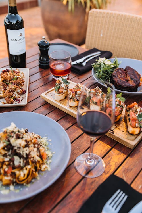 Foods on Drinks Served on Wooden Table