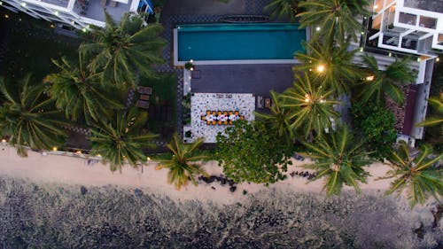 Birds Eye View of a Swimming Pool at a Beach Resort