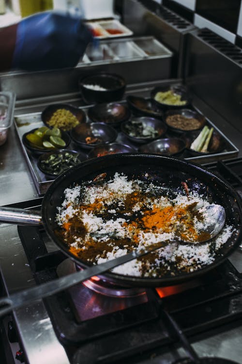 Free Cooking in Hot Black Pan Stock Photo