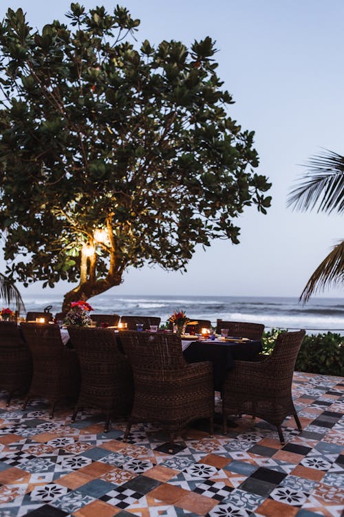 A Dining Table Set up by the Seaside