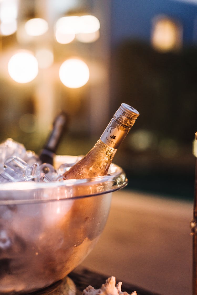 Bottle Of Wine In Glass Bowl With Ice 