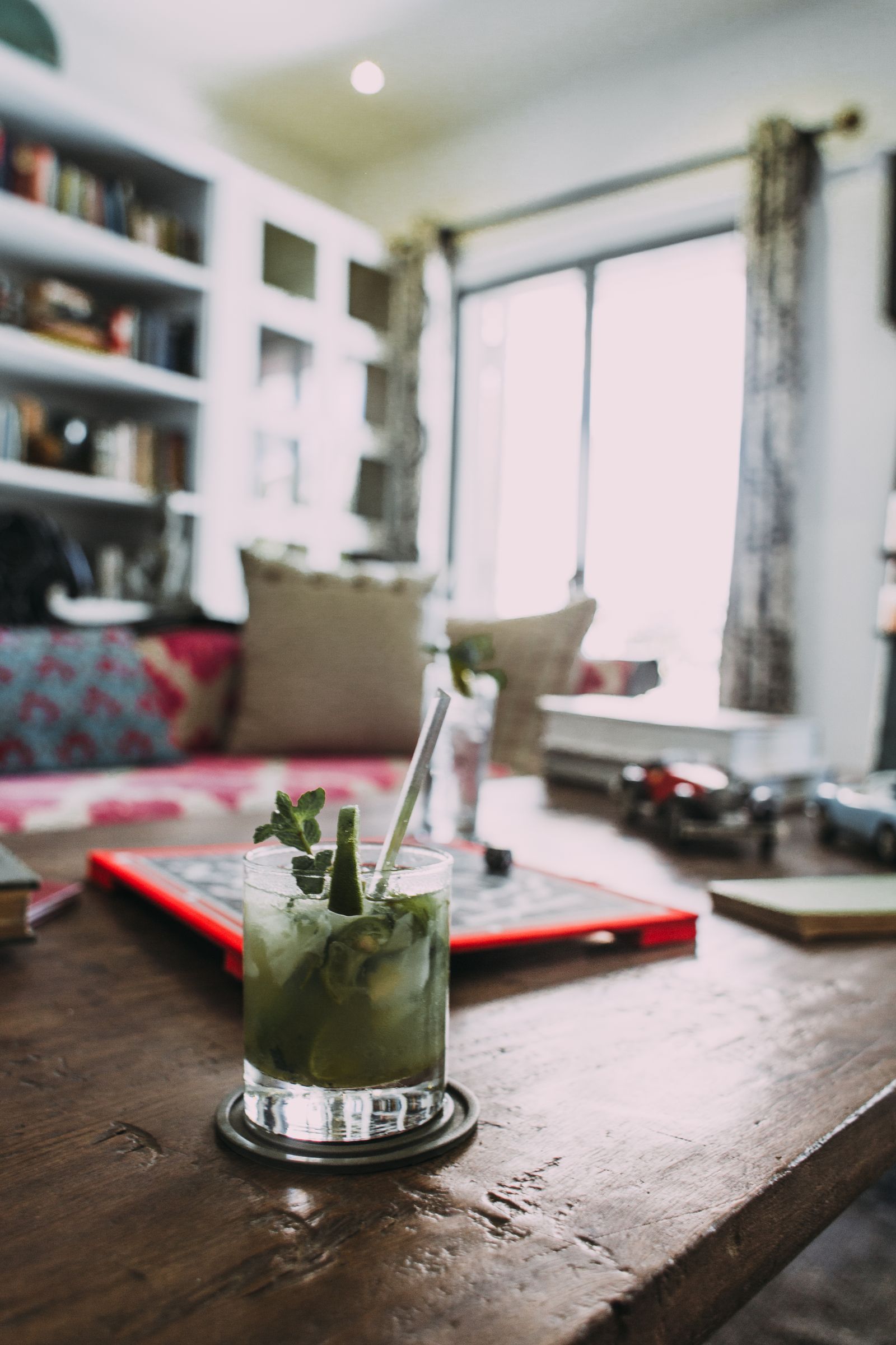 Drink on wooden table, warm light