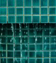 Water Dripping from Tile Surface