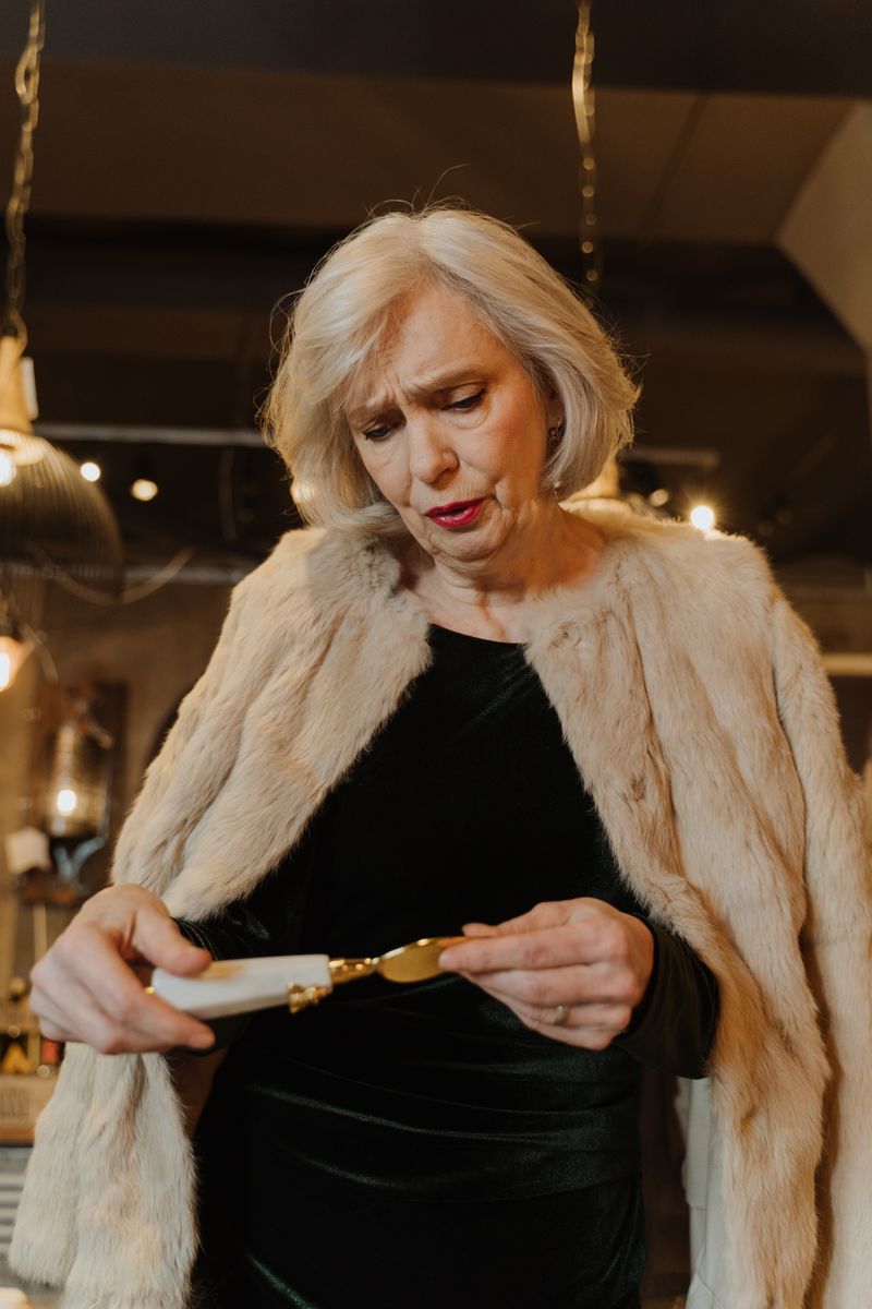 Elegant woman in fur coat at a dinner table