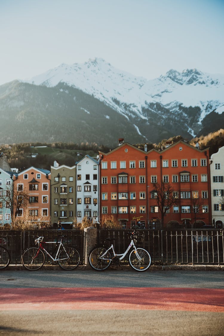 Parked Bicycles On Metal Fence