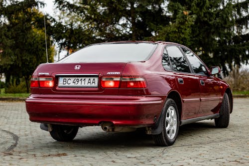 Free Red Honda Accord Parked on Pavement Stock Photo