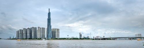 Cityscape with modern skyscrapers near river