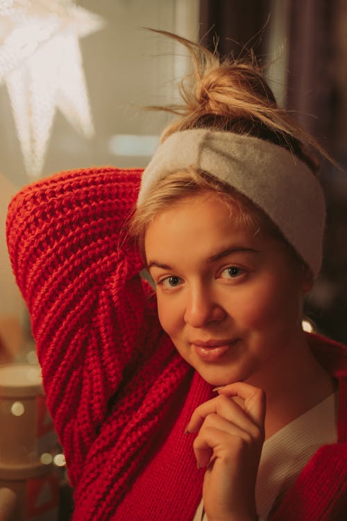 A Woman in Red Knitted Sweater