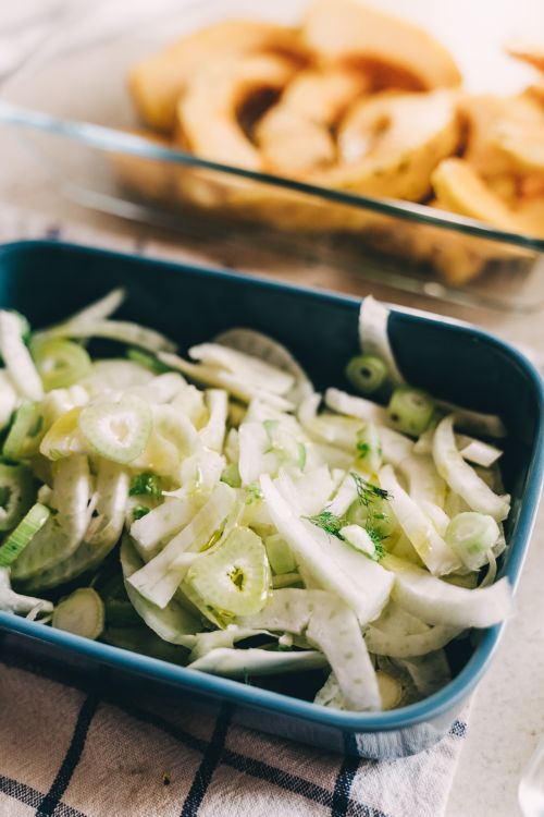 Free Close-up of fresh sliced vegetables in a blue container, perfect for healthy meals. Stock Photo