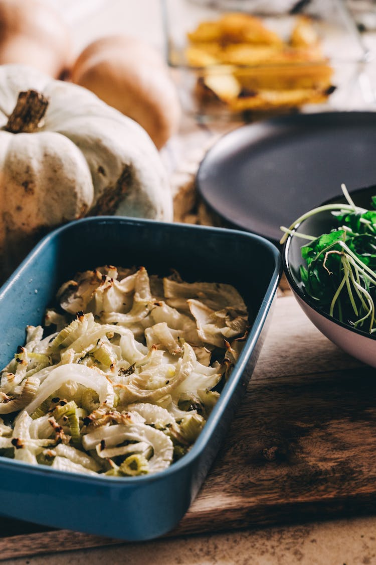 Cooked Vegetables On A Plastic Container