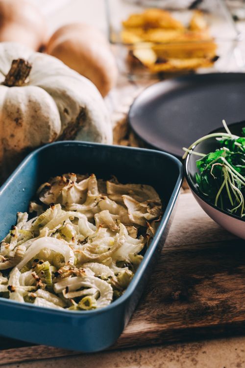 Free Delicious vegan dish featuring roasted vegetables and pumpkin, perfect for a healthy lifestyle. Stock Photo