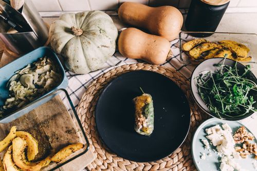 Free Flat lay of a healthy vegan meal with pumpkin and arugula in an Erfurt kitchen setting. Stock Photo