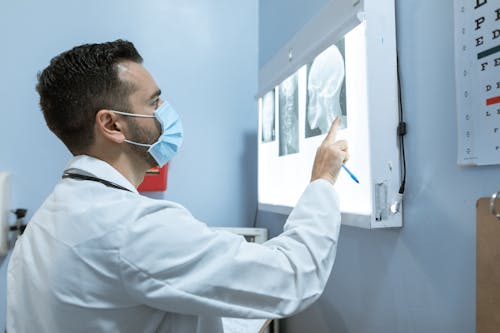 Doctor Looking at an X-ray Image