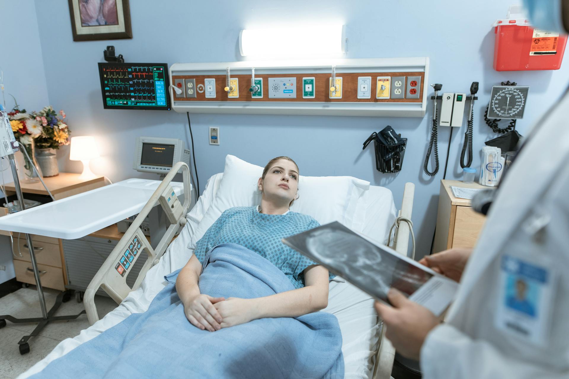 Woman Lying on Hospital Bed