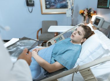 Semi-Fowler hospital bed with patient