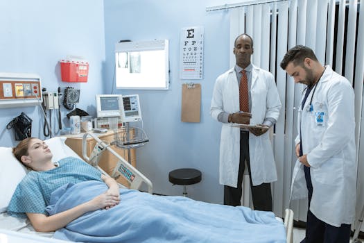 Doctors in lab coats attend to a patient lying in a hospital bed, emphasizing healthcare and medical care.