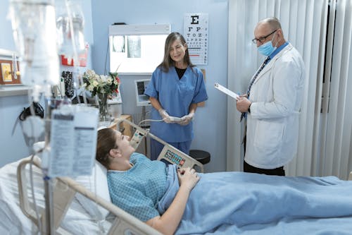 Free A Doctor Attending a Patient Stock Photo
