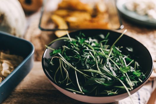 Close-up of fresh green vegetables in a bowl, perfect for healthy and organic vegan meals.
