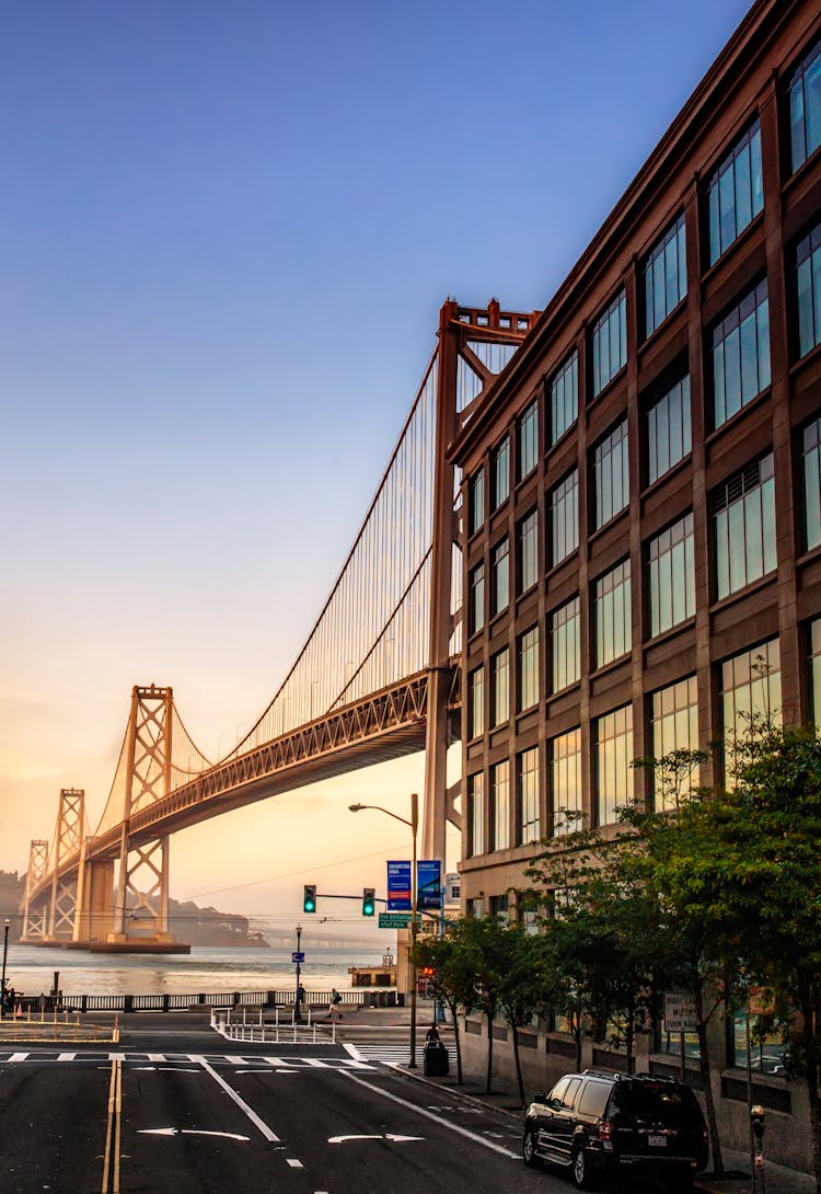 Brown Metal Bridge Near Building