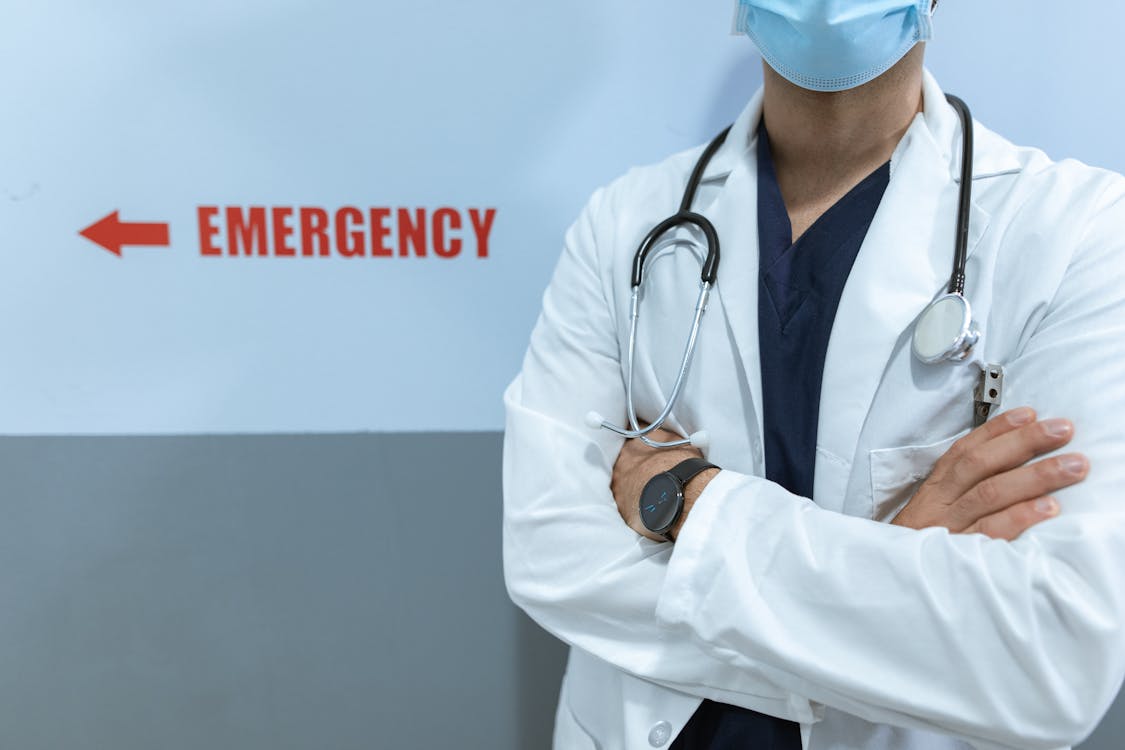 Free Male Doctor in White Coat Stock Photo
