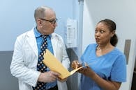 Medical Practitioners having a Discussion