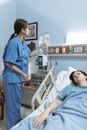 Nurse checking the Dextrose of a Patient