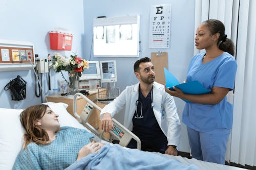 Free Doctor talking to a Patient Stock Photo