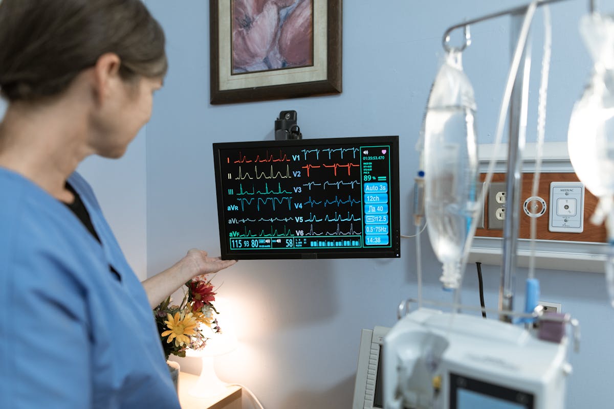 Hospital room with medical equipment and a bed
