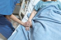 Nurse providing round-the-clock care to a resident