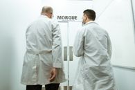 Doctors in White Robe Walking Towards the Door