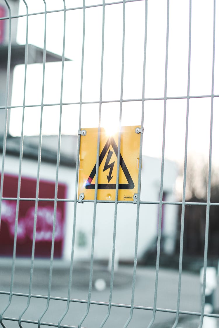 Sign Of High Voltage On Fence